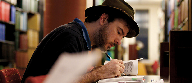 Man studying at the library