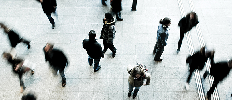 Overhead view of people walking in the street