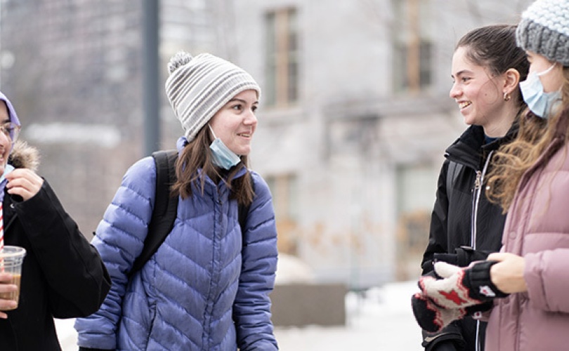 Four students talking 