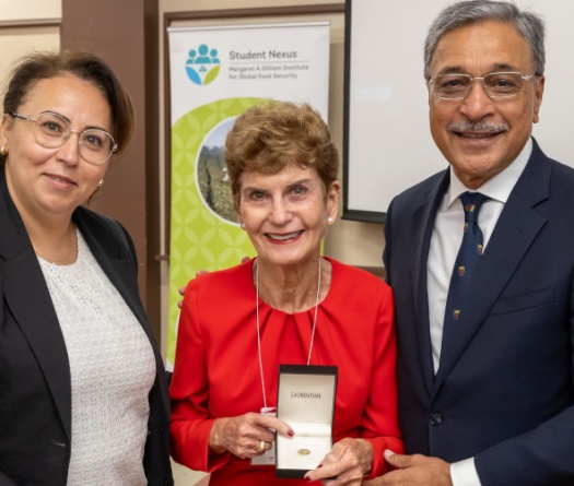 Three people standing together